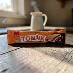 Medina Market Tonik Waffelriegel mit Schokoladenfüllung in orangefarbener Verpackung